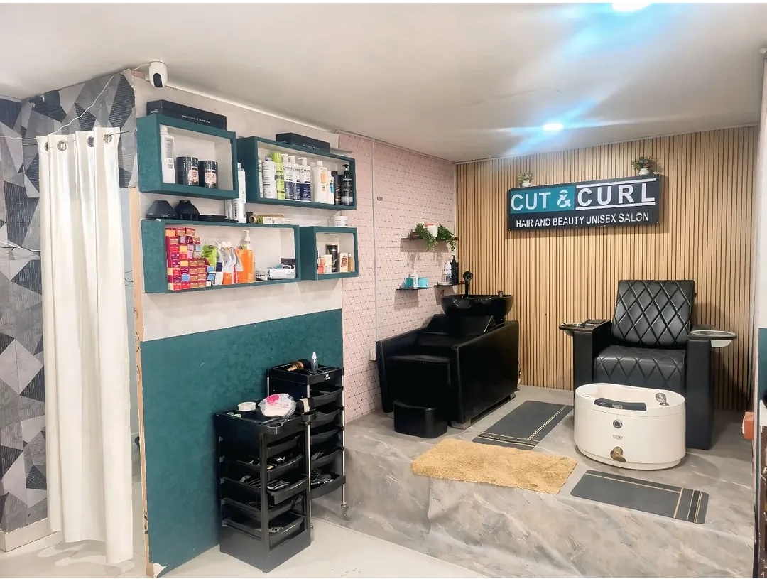 Hair wash and pedicure area at Cut & Curl